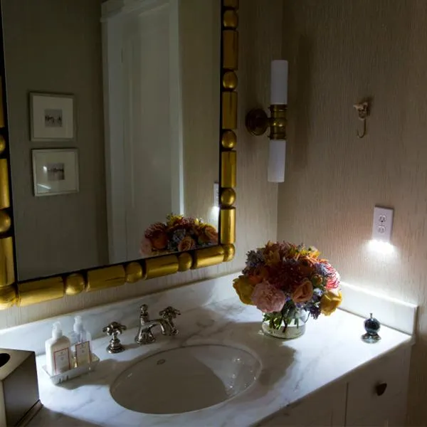 LED Wall-Outlet Coverplate With Built-In Light Sensor - No Batteries Required!