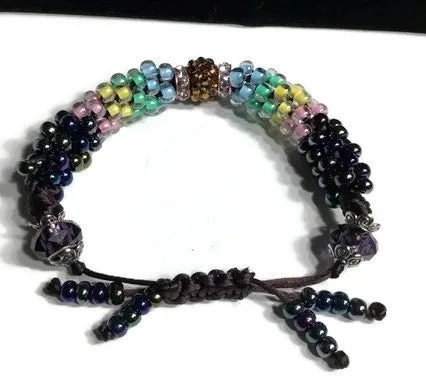 The multicolor flowers of the garden bracelet, handmade kumihimo wrislet, woman size, yellow,green,blue,pink,iris mix beads, macrame clasp,