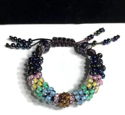 The multicolor flowers of the garden bracelet, handmade kumihimo wrislet, woman size, yellow,green,blue,pink,iris mix beads, macrame clasp,