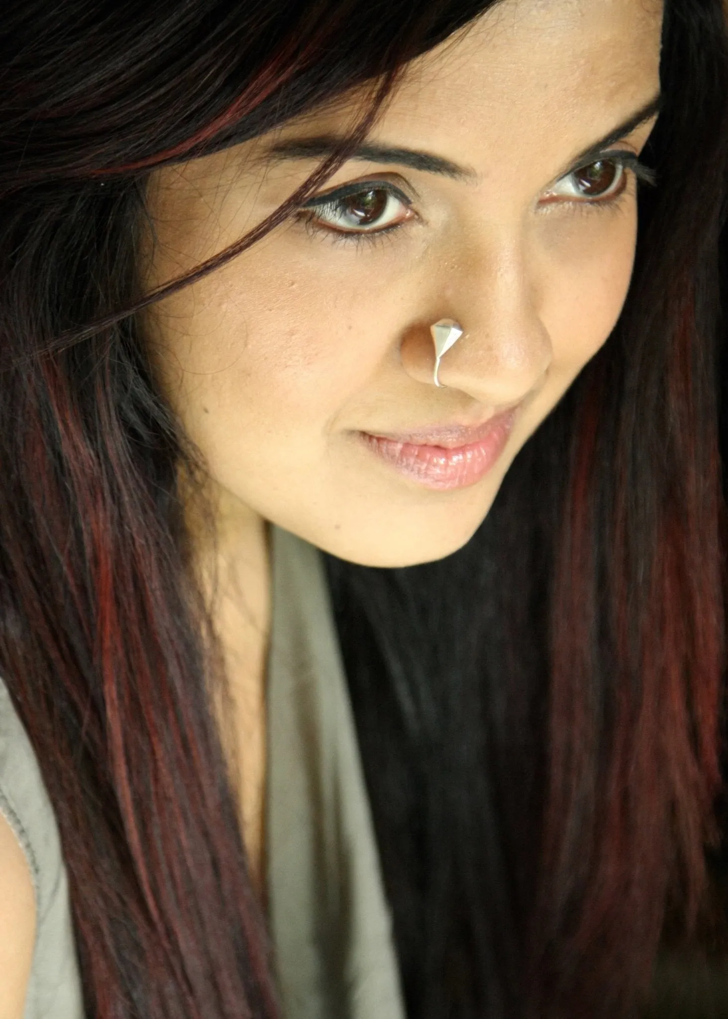 Unique, faceted diamond-shape nose pin
