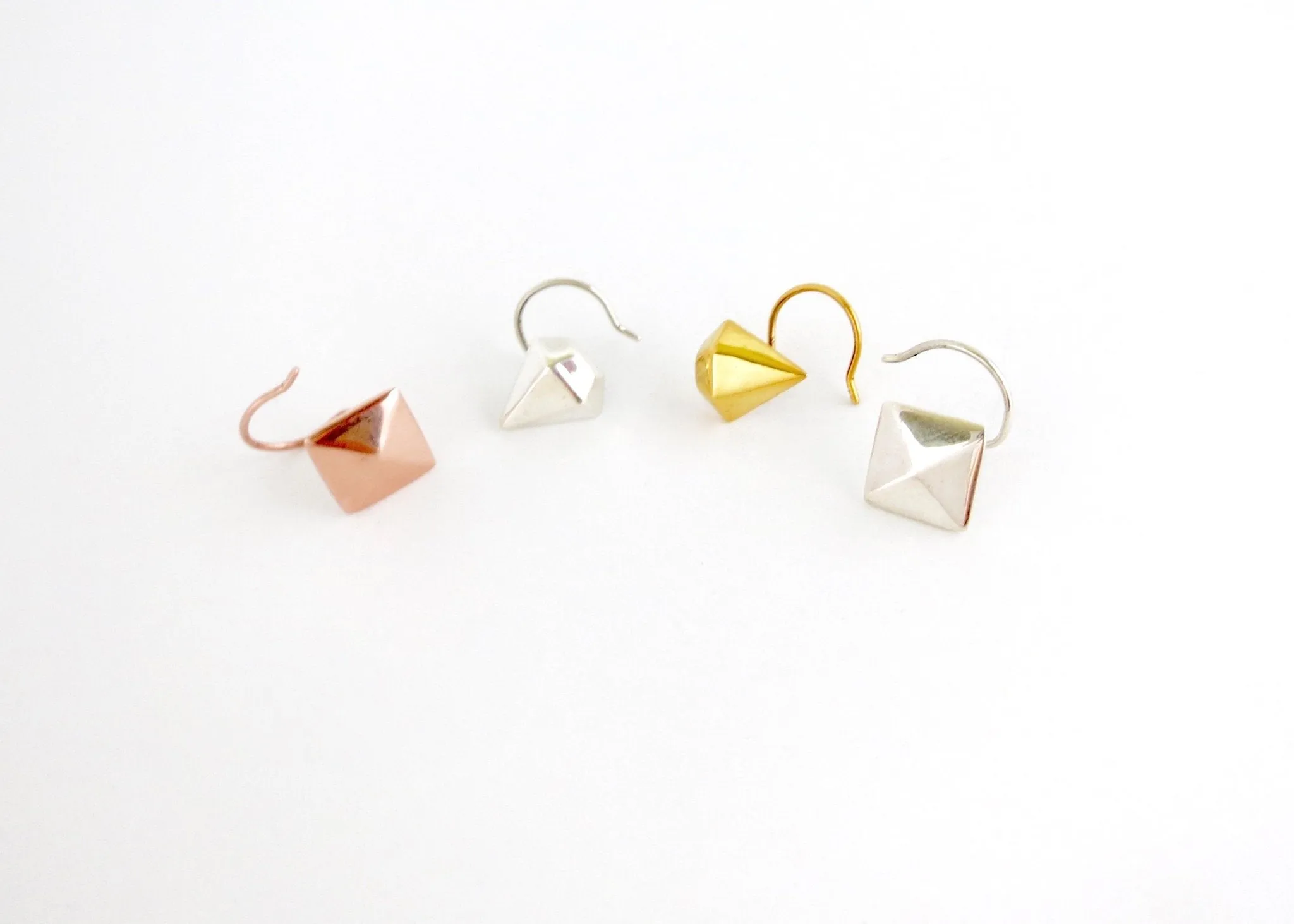 Unique, faceted diamond-shape nose pin